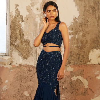 A Touch of Glamour: How the Mermaid Flare Shimmer Dress Transforms Lives | Trendy Threads