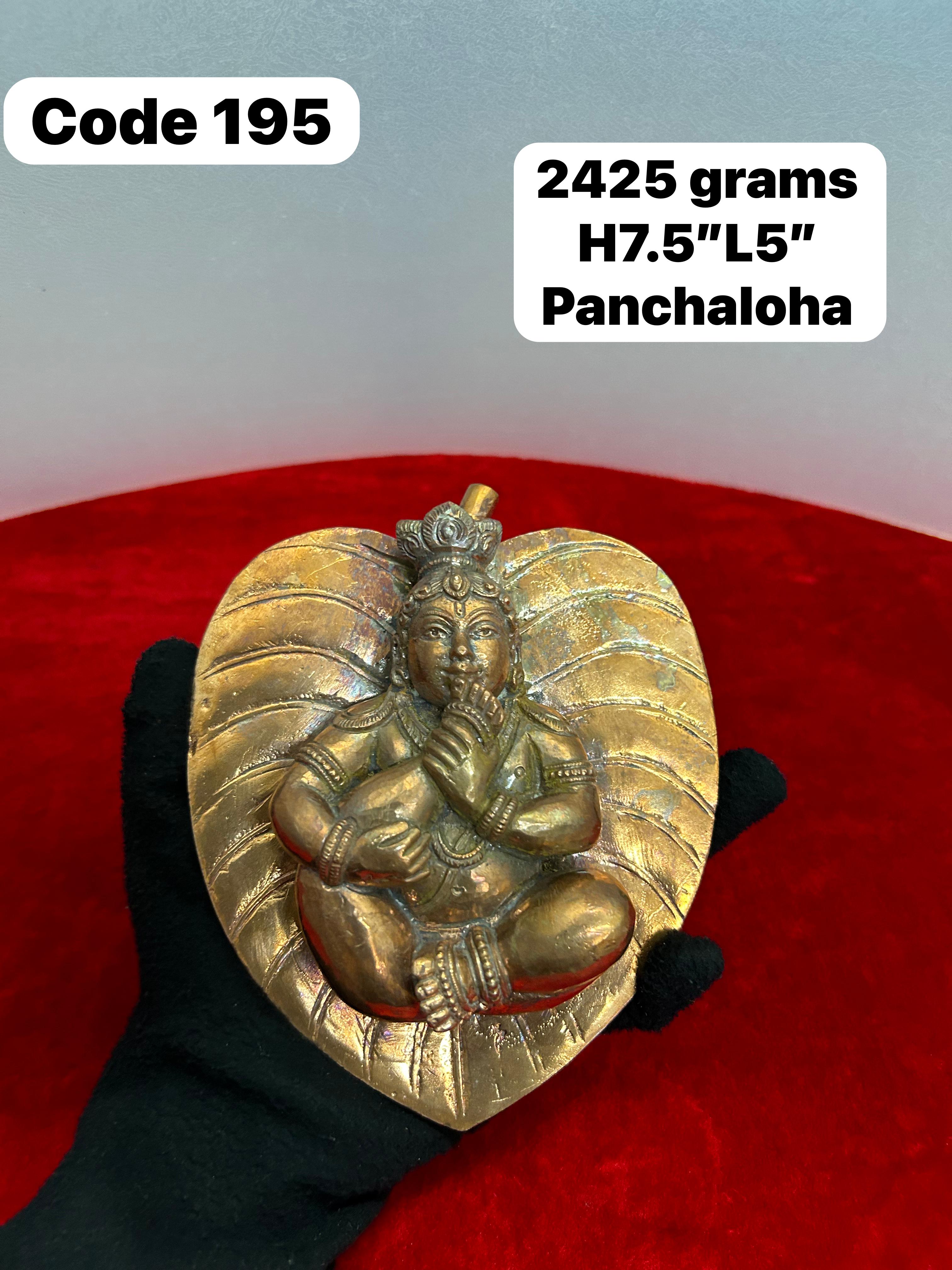 Discover the Divine Serenity of Panchaloha Sleeping Krishna on a Leaf: A Spiritual Game-Changer