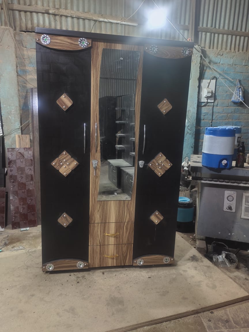 Transform Your Space with Our Triple Door Wooden Almira