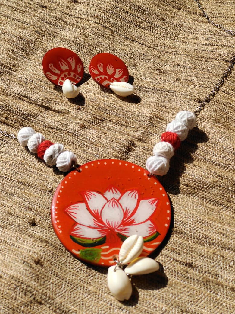 Embrace Tradition with Elegance: The Story of Cowrie Lotus Earrings