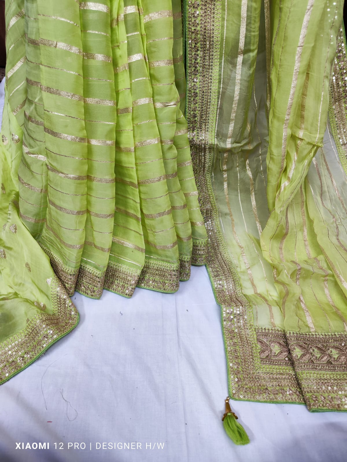 Celebrating Heritage with Every Drape: The Striped Khaddi Georgette Saree