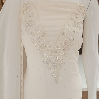 Discover the Elegance of Lucknowi Craft with Bella Fashion's Premium Suit