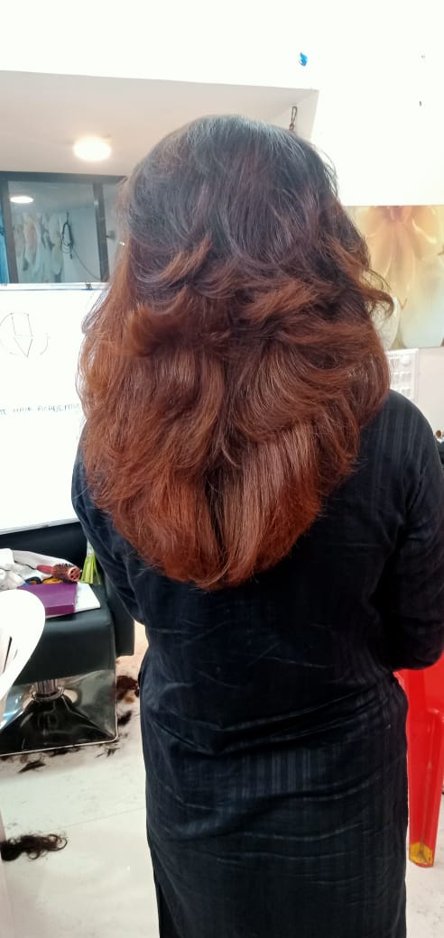 Transform Your Look: The Ultimate Haircut Experience at Dlux Beauty Salon & Academy