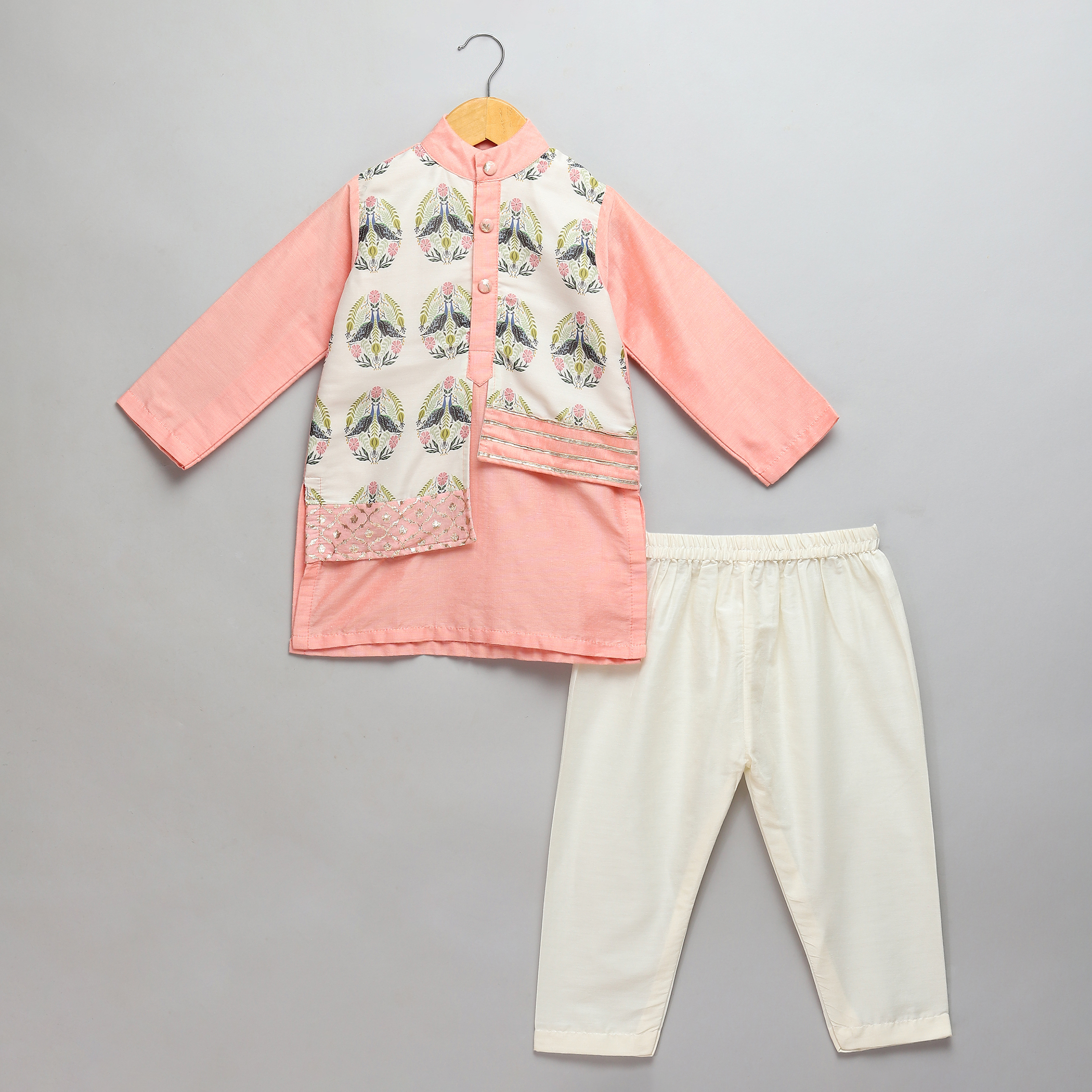 Embrace Tradition with a Modern Twist: The Peach Kurta Pyjama with Printed Jacket