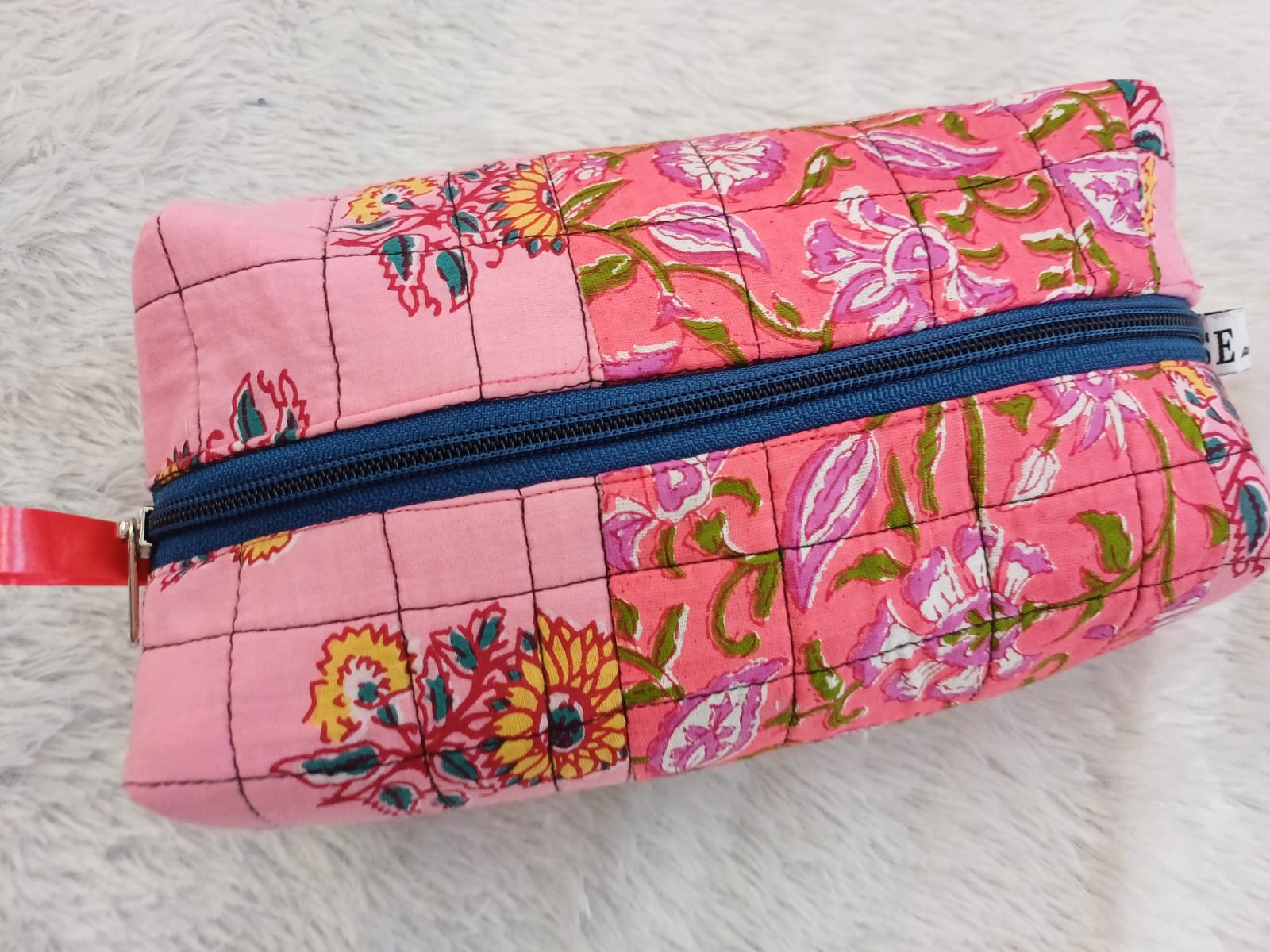 The Perfect Companion: How a Patchwork Quilted Toiletry Bag Solves Your Travel Woes
