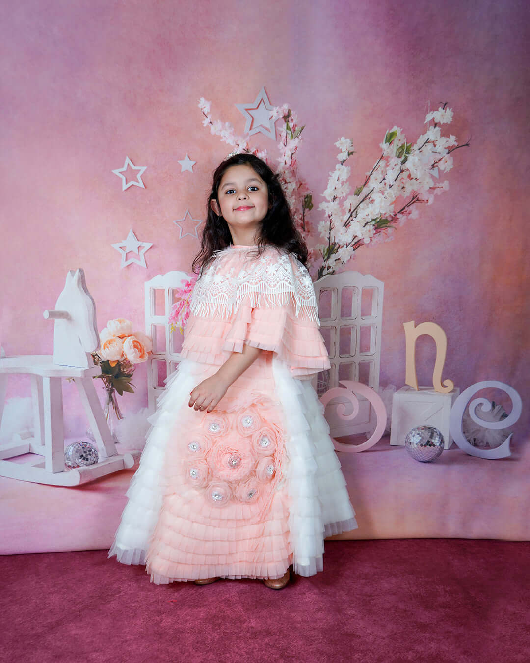 Embrace Elegance with the Peach White Cape Style Gown: A Fashion Story