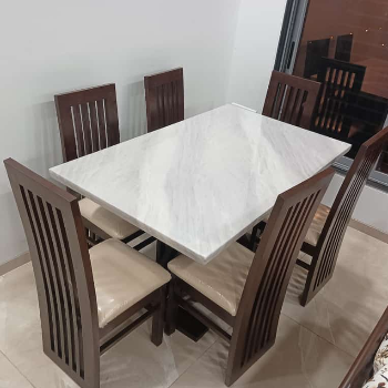 Transform Your Dining Experience with the Elegant Marble-Top Dining Table