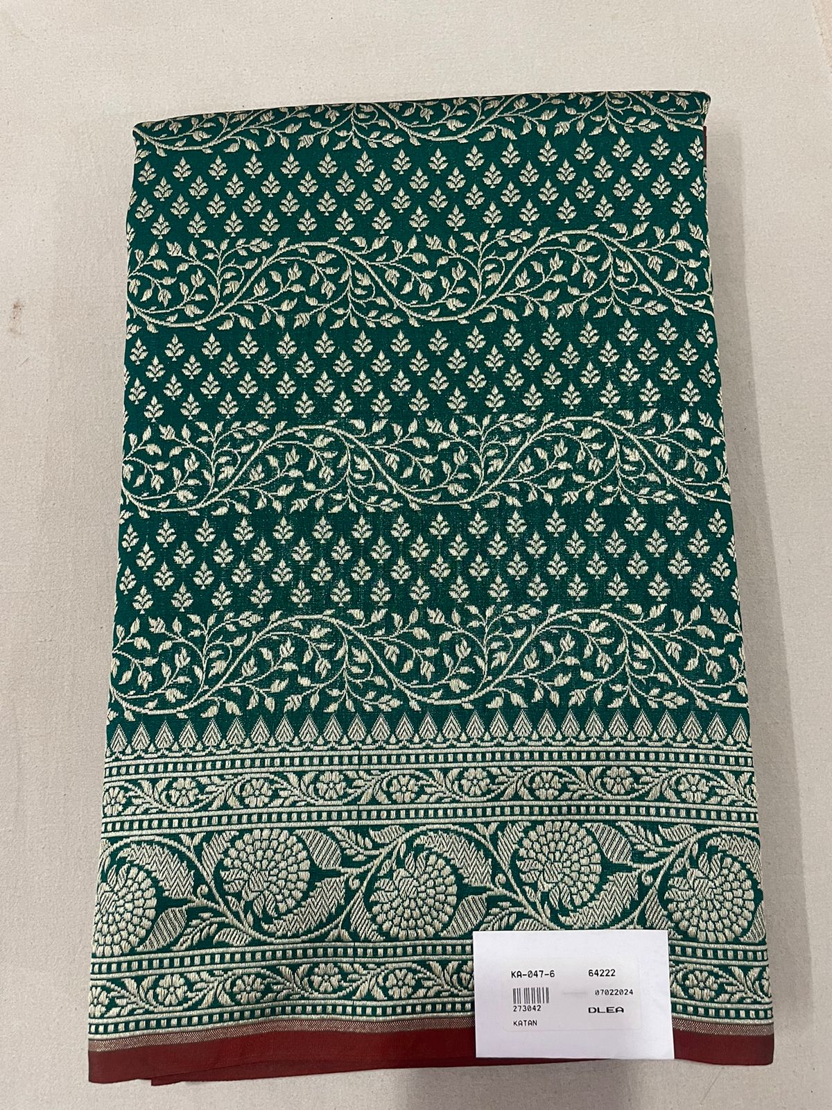 Embrace Elegance: The Midnight Green Brocade Saree Experience