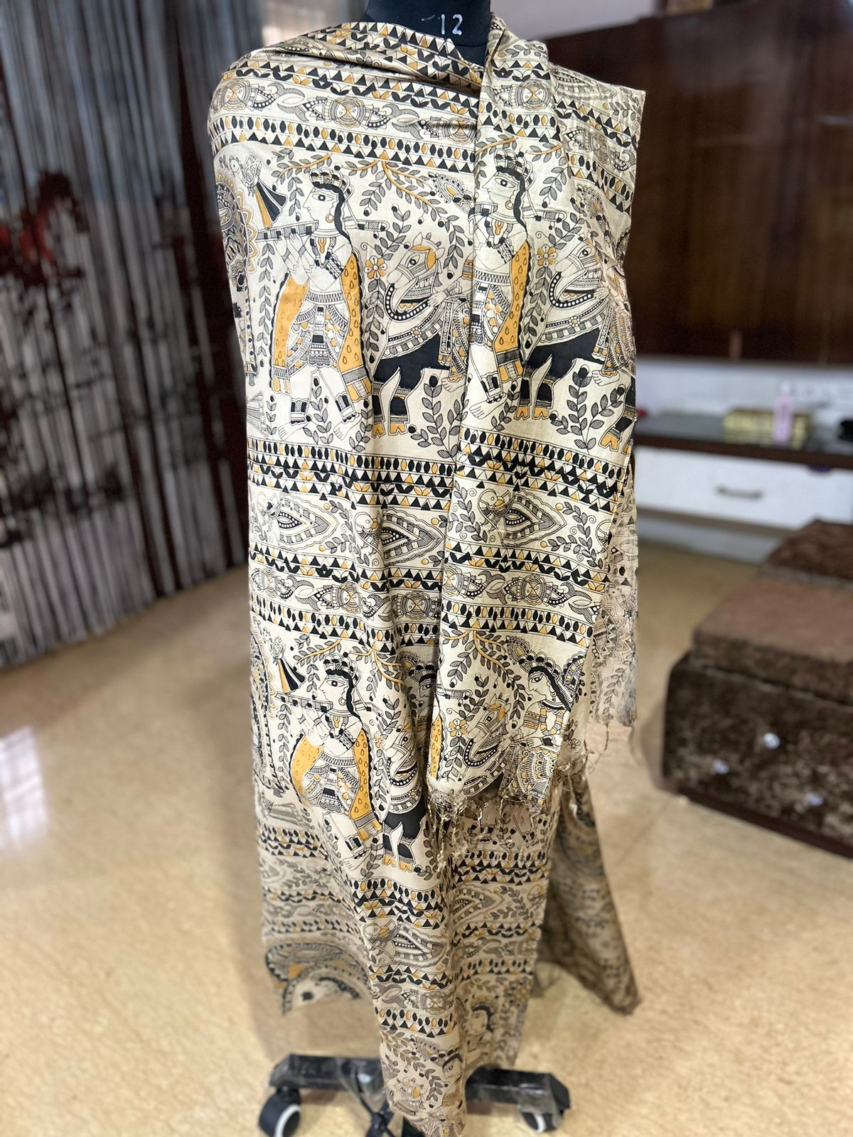 Embrace Tradition with Elegance: Discover the Allure of Madhubani Suit Material