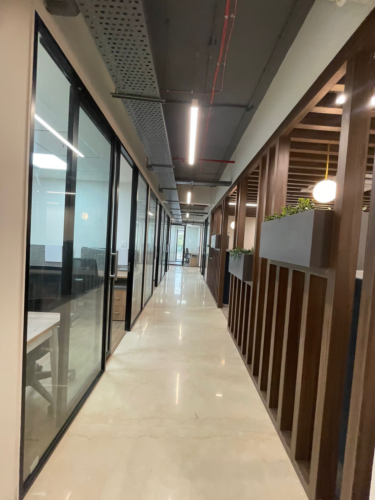 Transforming Workspaces with Sleek Glass Partitions: A Story of Innovation and Efficiency