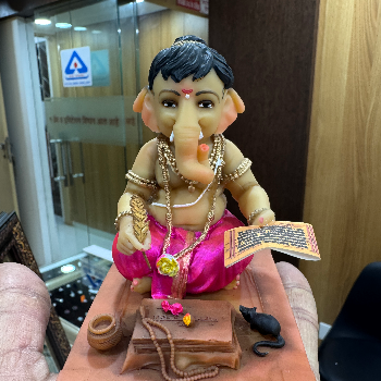  Car ganpati AMRUT GOLD Bazar Peth Rd, Near Maszid, Teli Ali, Amrut Gold, Khalde Aali, Talegaon Dabhade, Maharashtra 410506, India