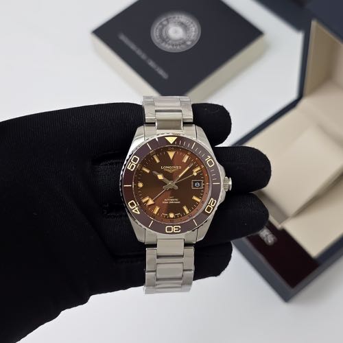 Longinee s Conquest GMT Brown-https://i-media.vyaparify.com/vcards/products/146227/1.jpeg Image