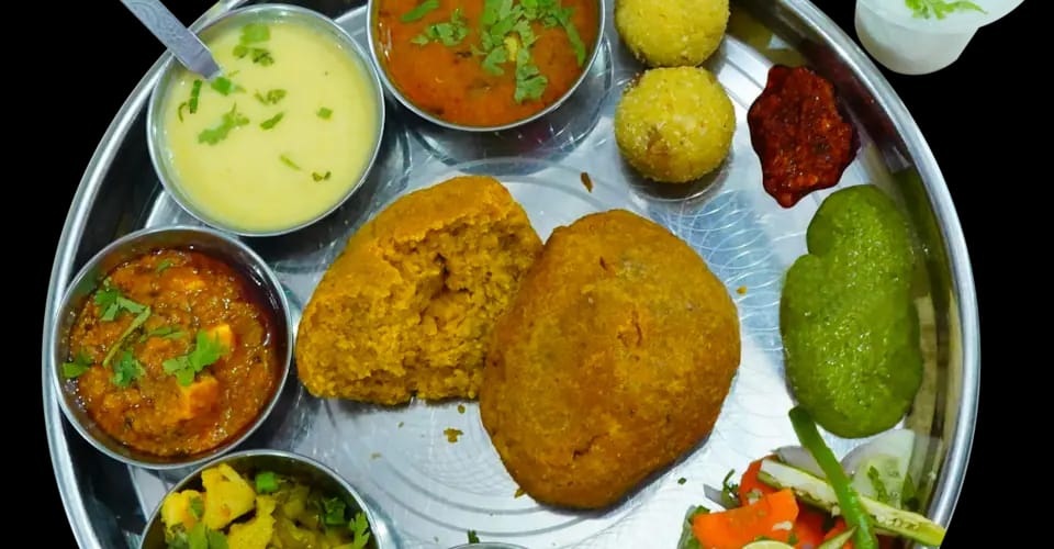 Sharma Bhojnalay Special Dal Bafla Thali-https://i-media.vyaparify.com/vcards/products/1708/IMG-20230611-WA0044.jpg Image