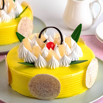 Pineapple cake-https://i-media.vyaparify.com/vcards/products/191176/product_1744906492_680128fc75dad.png Image