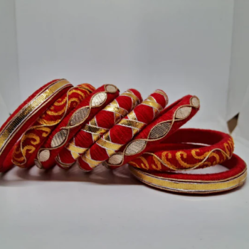 Neeva [Red and golden Handcrafted Bangles]-https://i-media.vyaparify.com/vcards/products/210294/product_1746241919_6815897fce7a7.png Image