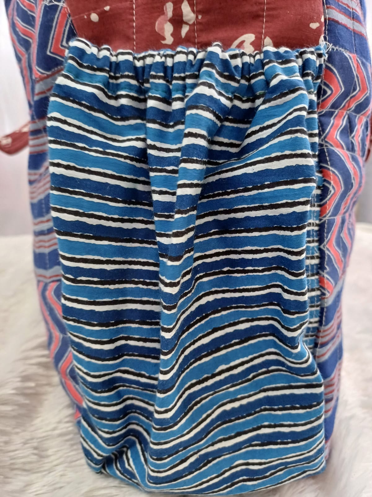 Water bottle pouch-https://i-media.vyaparify.com/vcards/products/21498/WhatsApp-Image-2024-01-10-at-17.22.22.jpeg Image