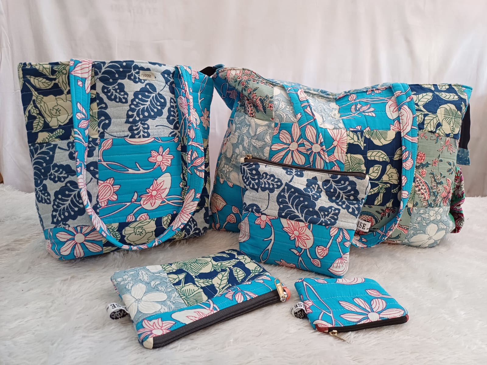 Quilted blue bag collection-https://i-media.vyaparify.com/vcards/products/21520/WhatsApp-Image-2024-01-10-at-17.22.56.jpeg Image