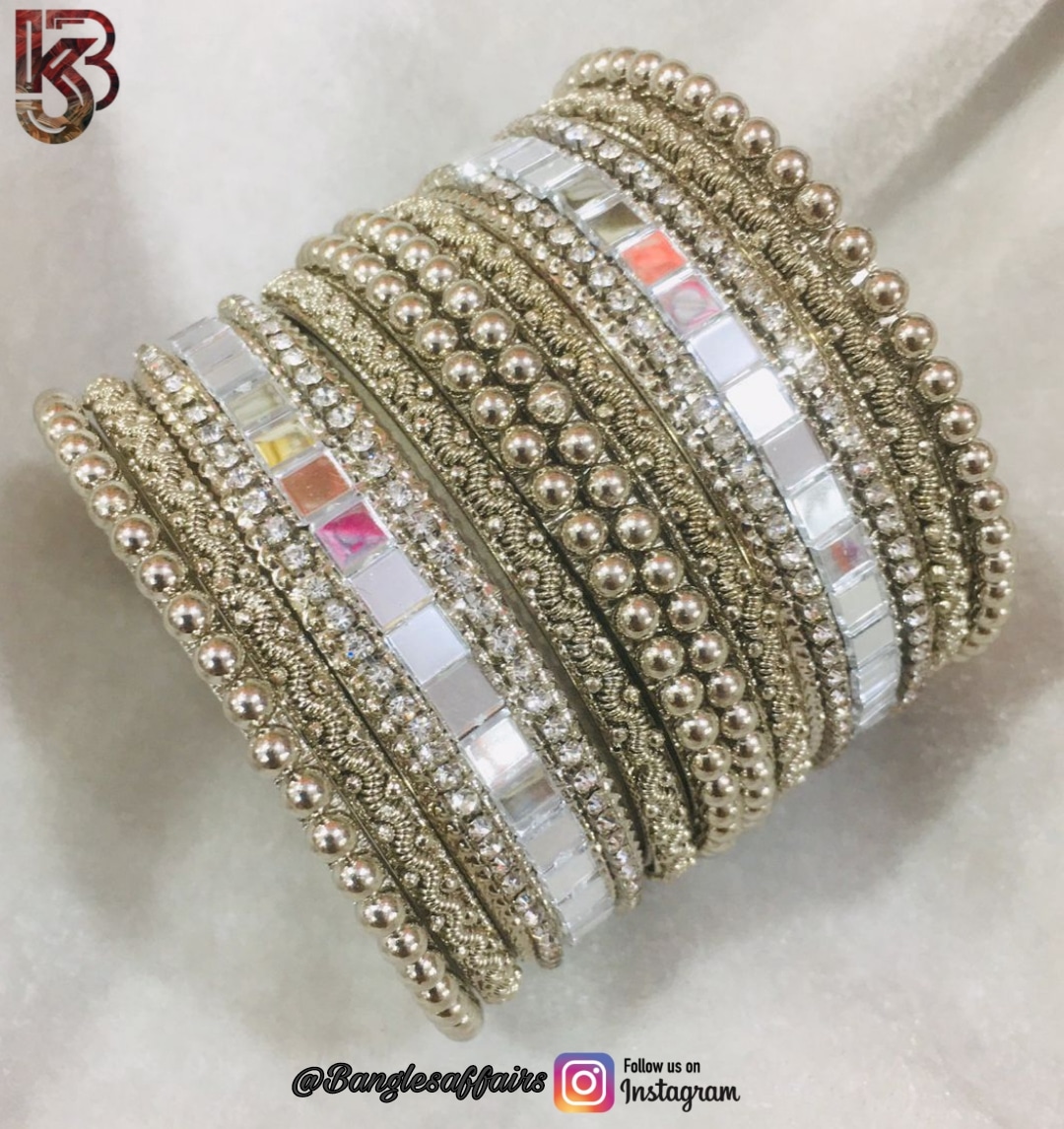OXIDISED BANGLES SETS-https://i-media.vyaparify.com/vcards/products/26987/WhatsApp-Image-2022-04-04-at-8.57.36-PM.jpeg Image