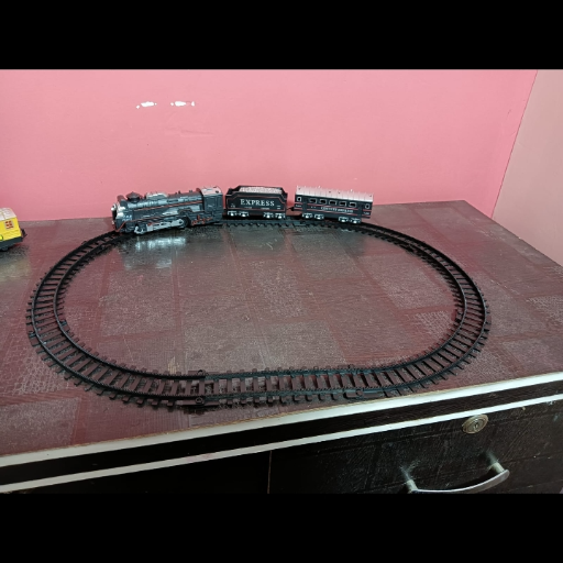 train toy with a track and smoke feature-https://i-media.vyaparify.com/vcards/products/296244/product_1750446432_6855b160eb23f.png Image