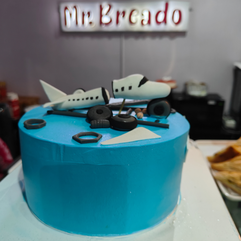 Aeroplane cake-https://i-media.vyaparify.com/vcards/products/302096/product_1755763957_68a6d4f55e578.jpeg Image