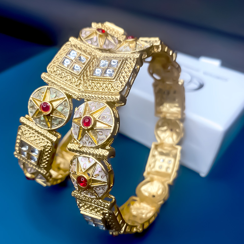 GOLD KADA WITH RED STONE-https://i-media.vyaparify.com/vcards/products/303005/product_1757668006_68c3e2a6867ac.jpeg Image