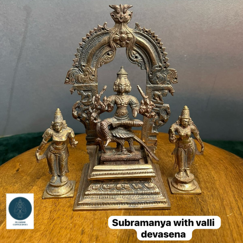 Subramanya with valli devasena including peeta prabahavali - made of Bronze-https://i-media.vyaparify.com/vcards/products/303236/product_1758017694_68c9389ea526a.jpeg Image