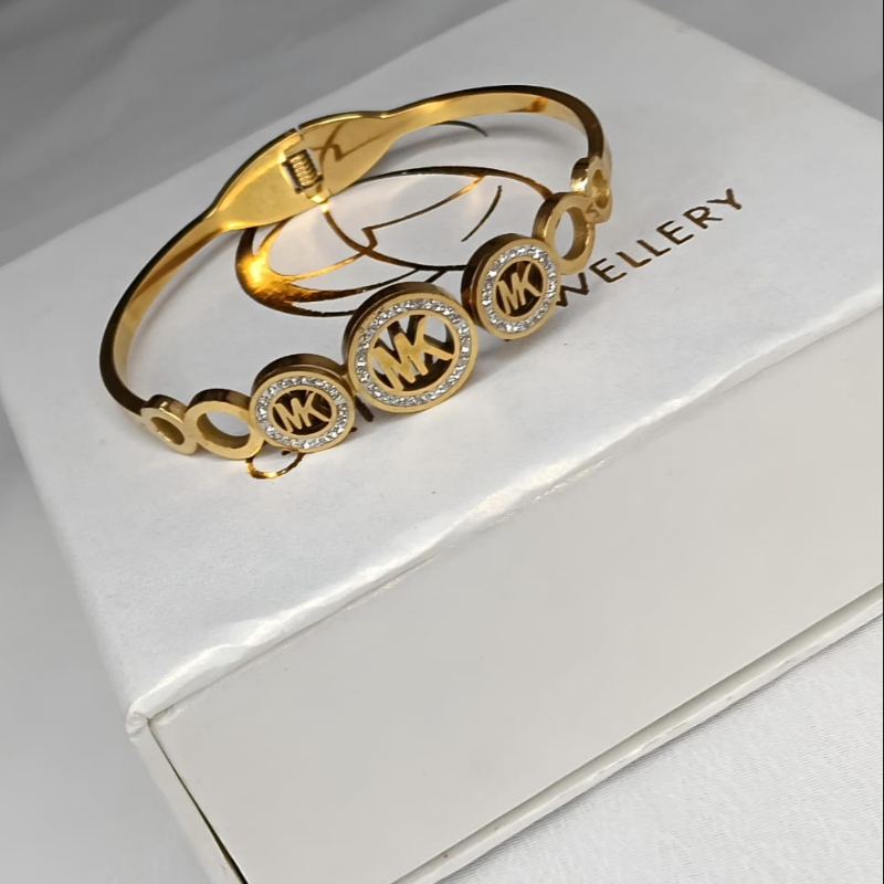 Golden MK Elegance Bracelet-https://i-media.vyaparify.com/vcards/products/305162/product_1761734515_6901ef738baf6.jpeg Image