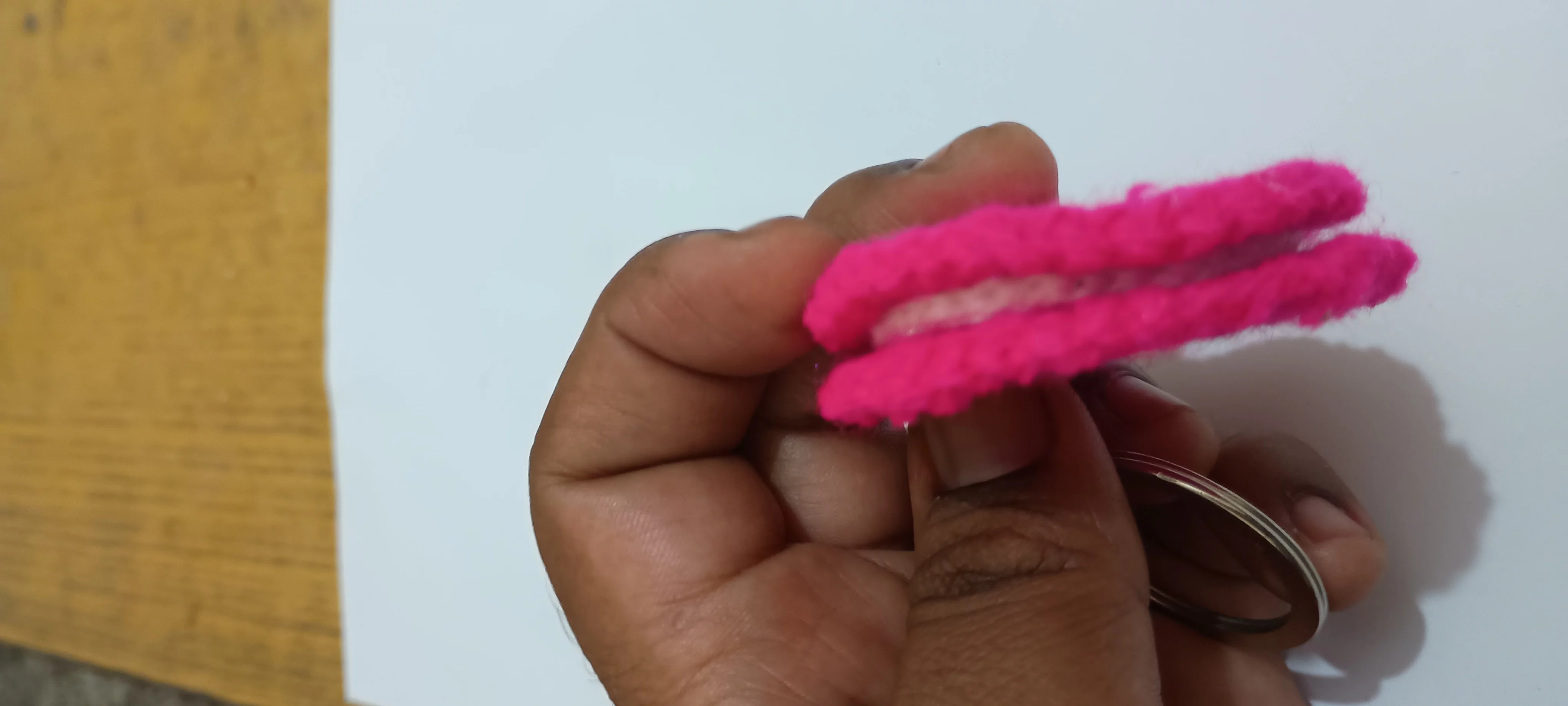 Pink oreo keychain car danglers bag charm-https://i-media.vyaparify.com/vcards/products/313893/product_1778594124_6a03314ce697c.webp Image