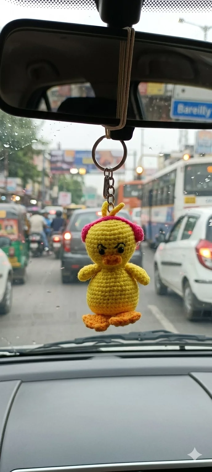 Angie the angry duckling in headphones bag charm keychain car dangler-https://i-media.vyaparify.com/vcards/products/313969/product_1778655294_6a04203e8596a.webp Image
