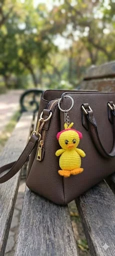 Angie the angry duckling in headphones bag charm keychain car dangler-https://i-media.vyaparify.com/vcards/products/313970/product_1778655294_6a04203eb55d2.webp Image