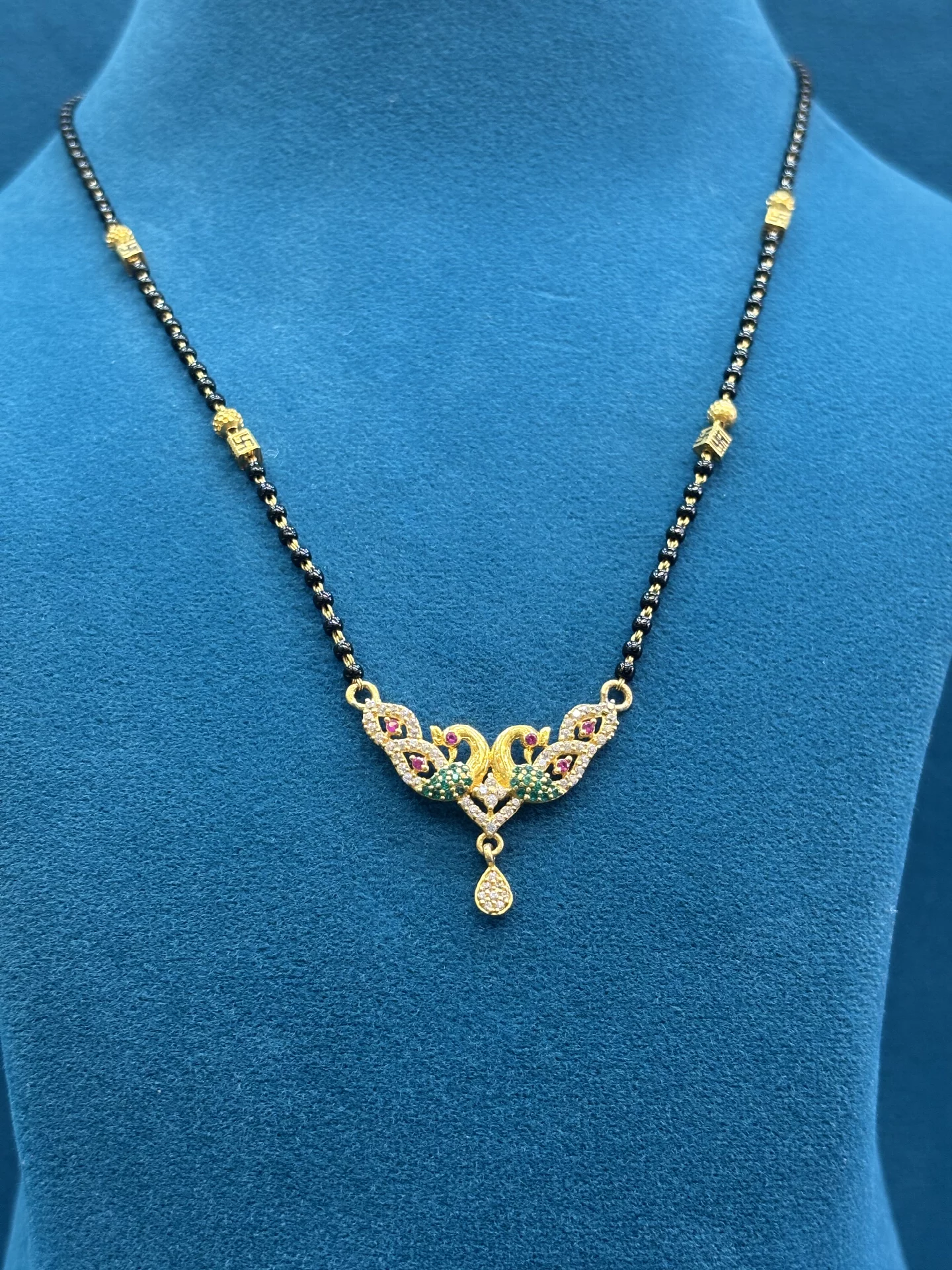 Peacock Style Black Beads Amrutha Jewellers 23-11-7, Nageswara Rao Pantulu Rd, Satyaranayana Puram, Vijayawada, Andhra Pradesh 520011, India