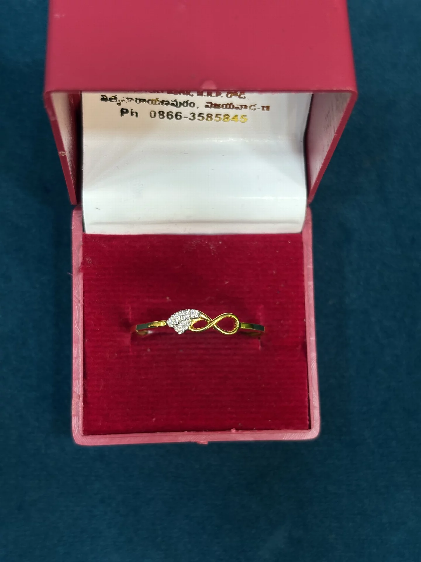 Infinity Diamond Ring Amrutha Jewellers 23-11-7, Nageswara Rao Pantulu Rd, Satyaranayana Puram, Vijayawada, Andhra Pradesh 520011, India