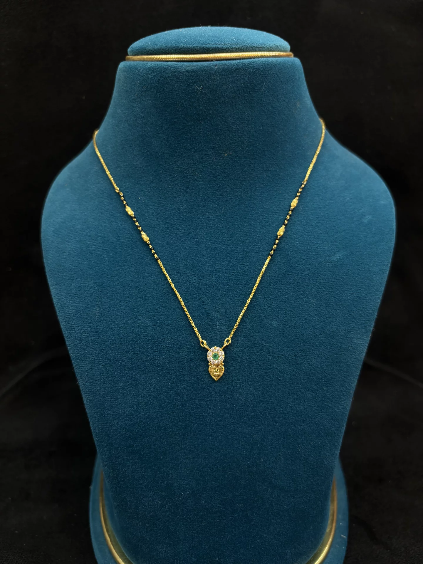 Lakshmi black beads chain Amrutha Jewellers 23-11-7, Nageswara Rao Pantulu Rd, Satyaranayana Puram, Vijayawada, Andhra Pradesh 520011, India