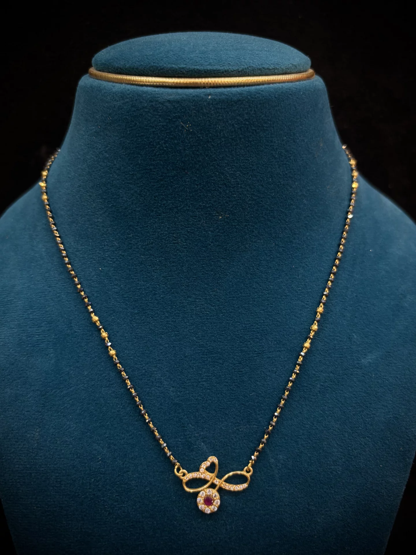 Black Beads Chain Amrutha Jewellers 23-11-7, Nageswara Rao Pantulu Rd, Satyaranayana Puram, Vijayawada, Andhra Pradesh 520011, India