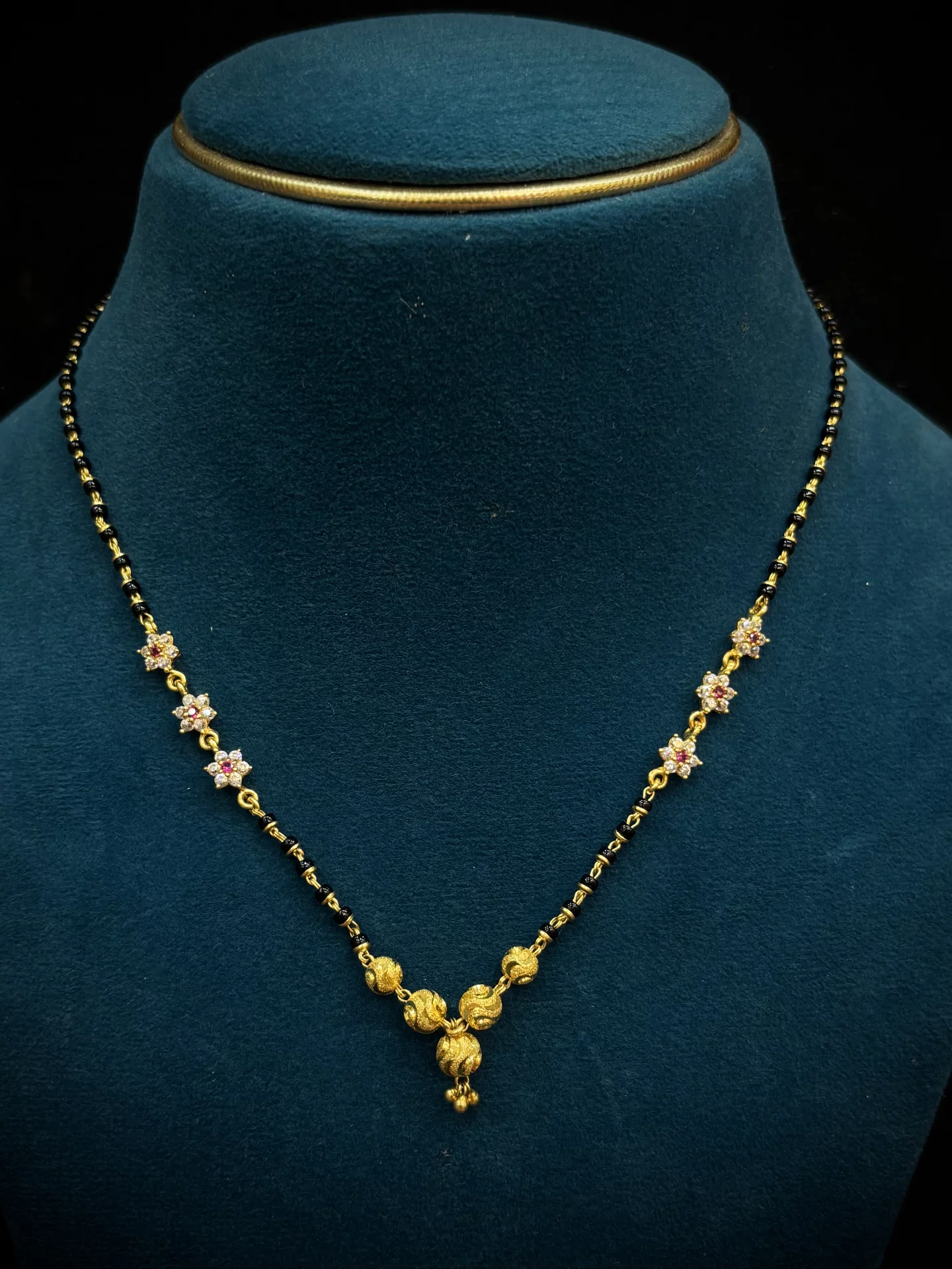 Dd balls black beads chain Amrutha Jewellers 23-11-7, Nageswara Rao Pantulu Rd, Satyaranayana Puram, Vijayawada, Andhra Pradesh 520011, India