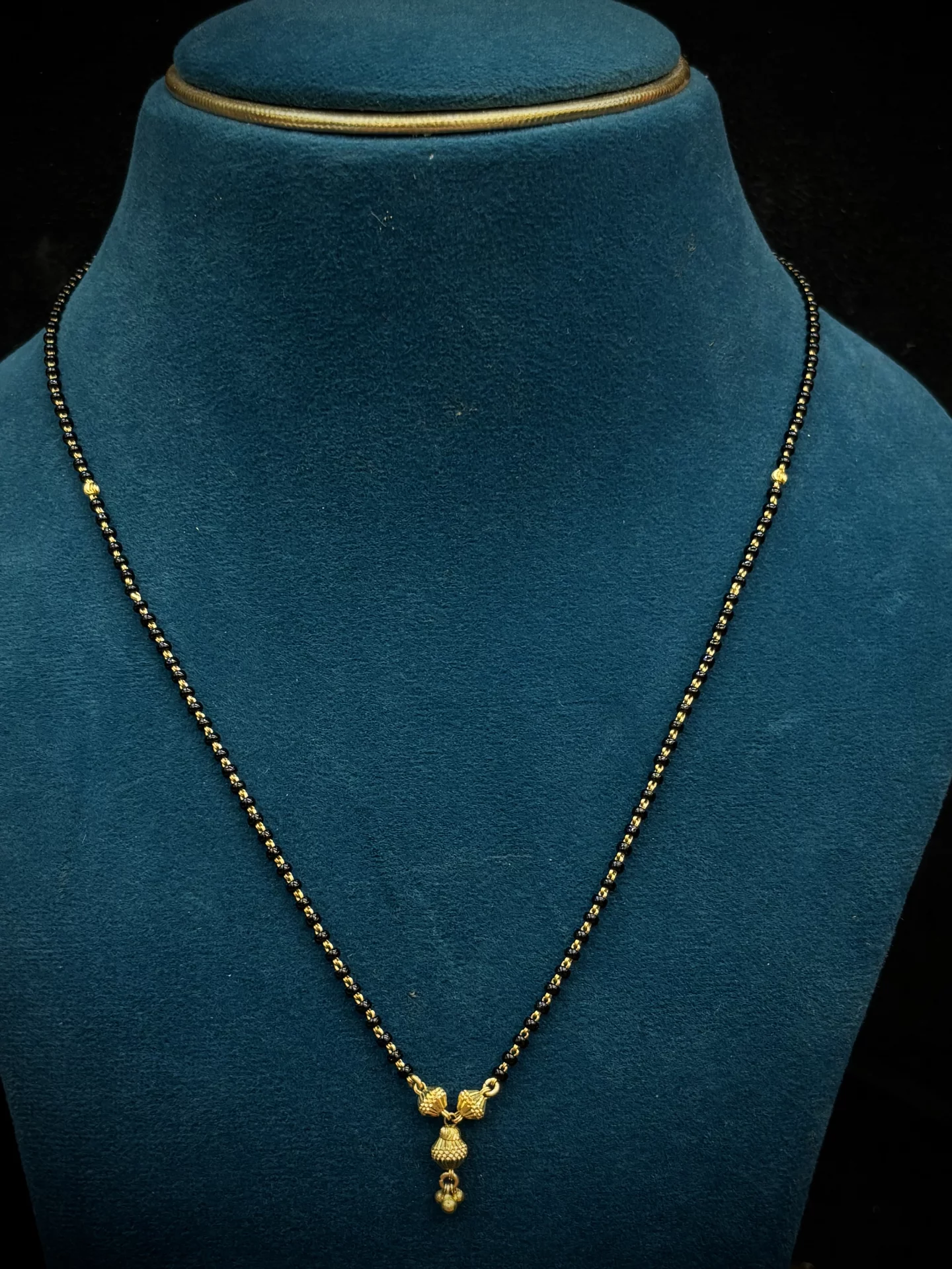 Dd balls black beads chain Amrutha Jewellers 23-11-7, Nageswara Rao Pantulu Rd, Satyaranayana Puram, Vijayawada, Andhra Pradesh 520011, India
