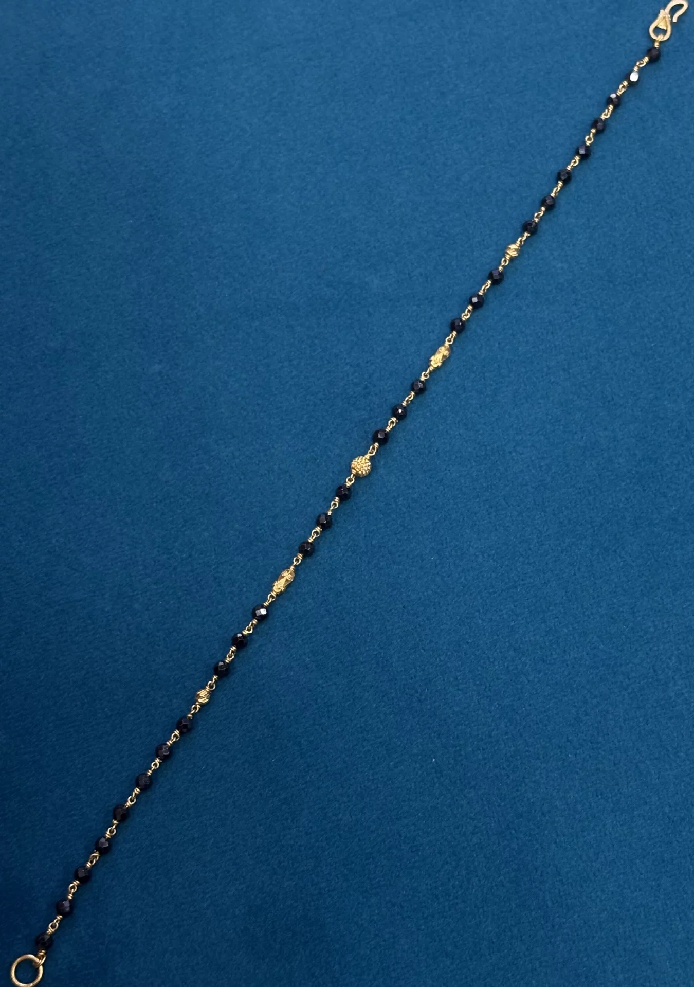 Black beads Ladies bracelet Amrutha Jewellers 23-11-7, Nageswara Rao Pantulu Rd, Satyaranayana Puram, Vijayawada, Andhra Pradesh 520011, India