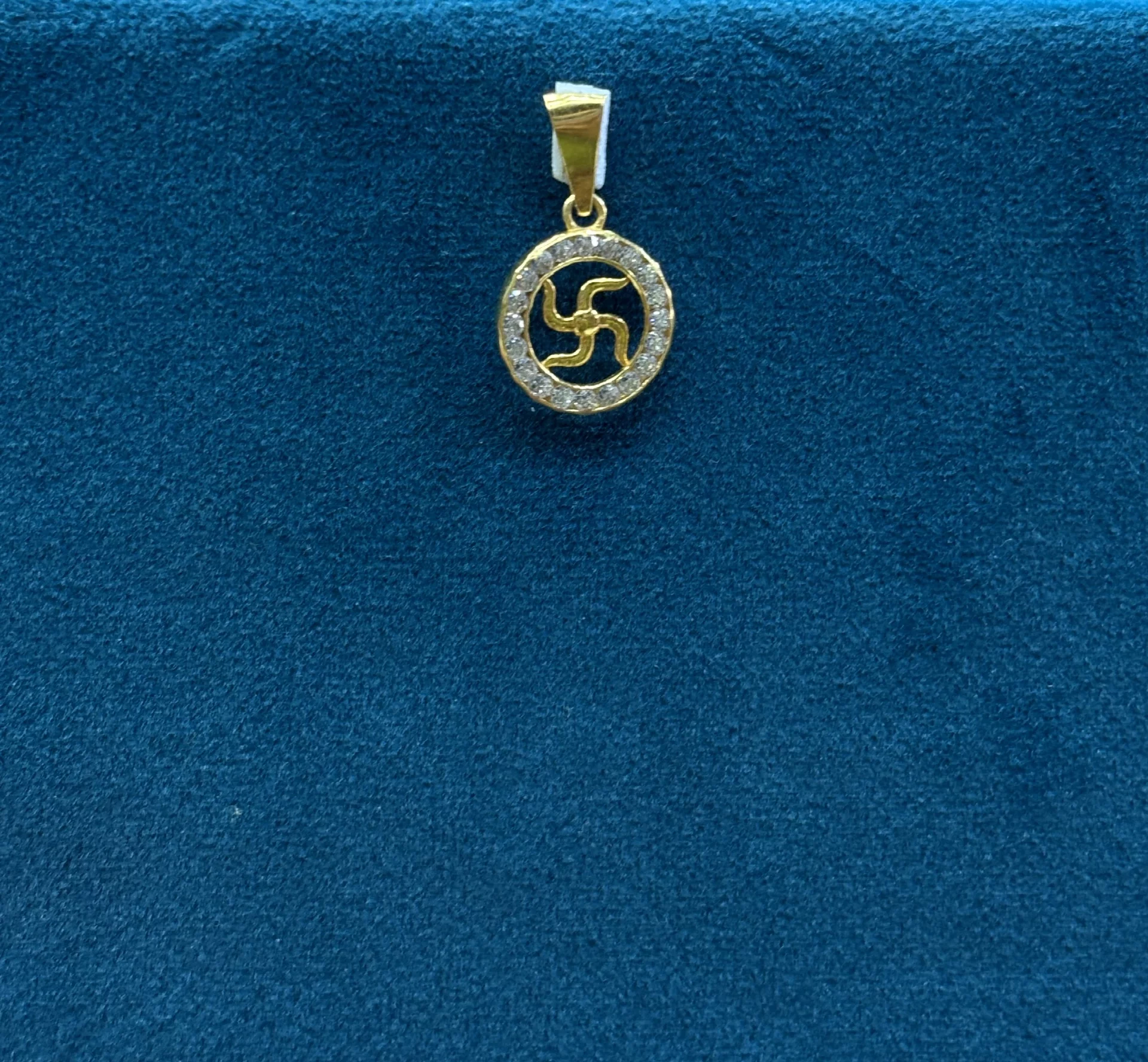 Gold Swasthick Locket Amrutha Jewellers 23-11-7, Nageswara Rao Pantulu Rd, Satyaranayana Puram, Vijayawada, Andhra Pradesh 520011, India