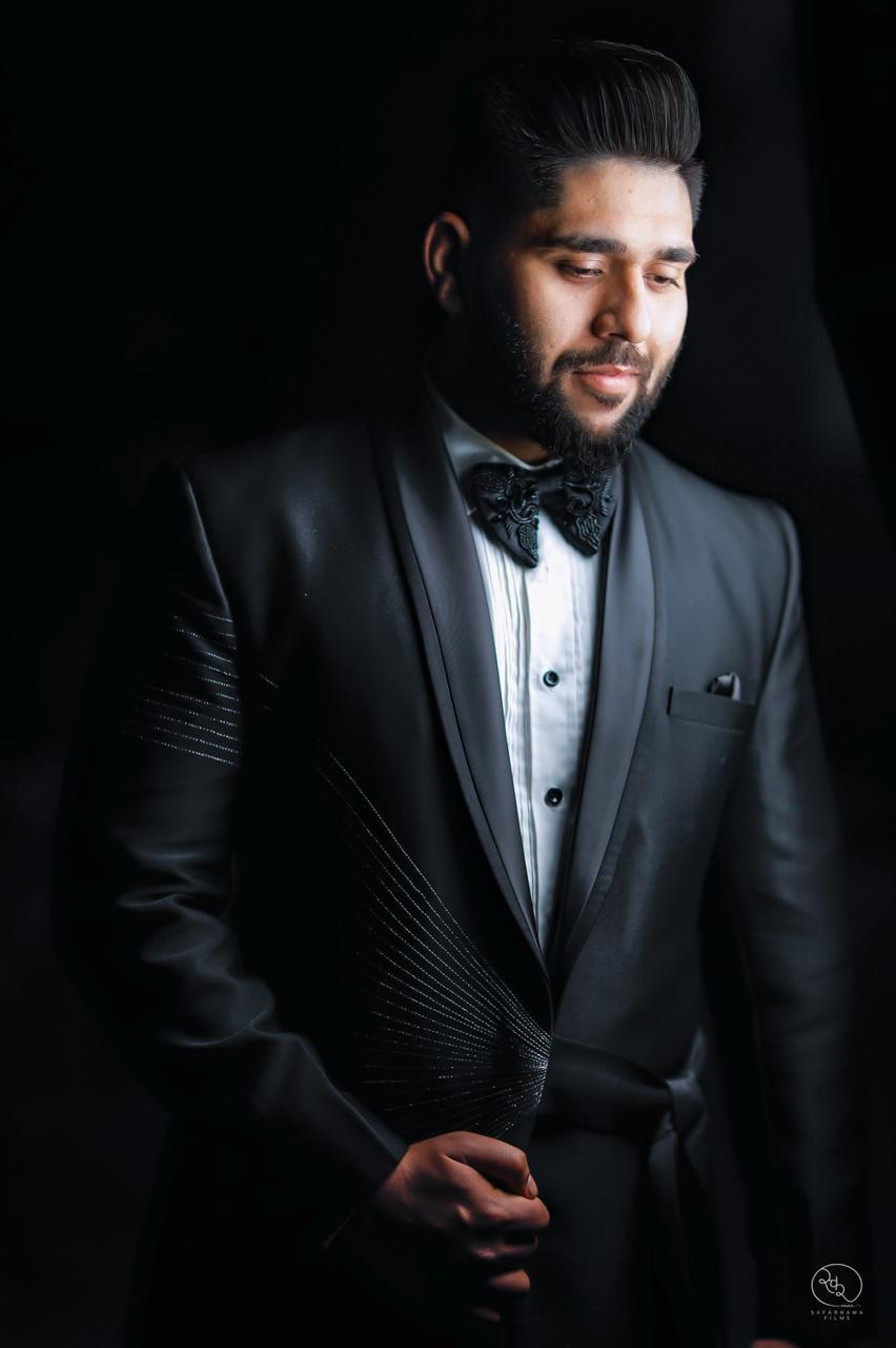 Sleek Black Rick Fabric Tuxedo-https://i-media.vyaparify.com/vcards/products/38503/Product-21.1.jpeg Image