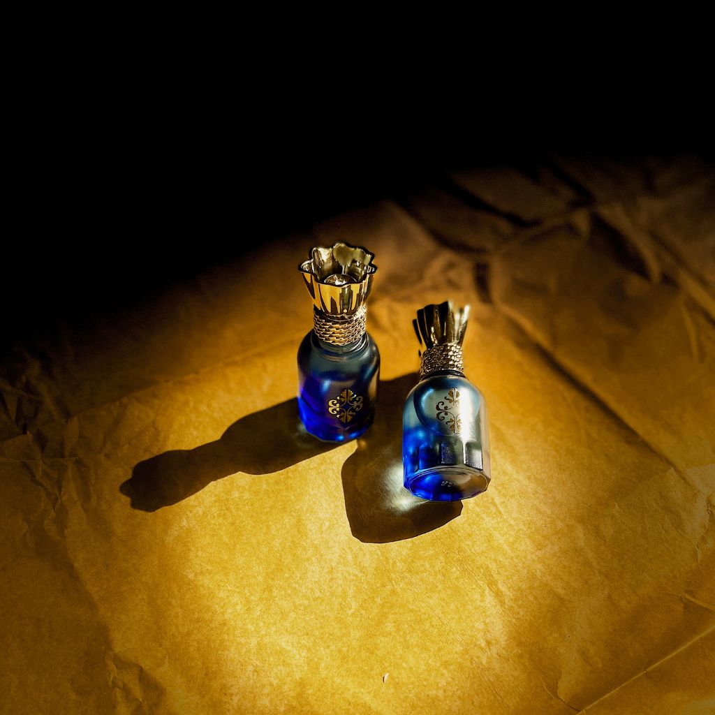 SANDALWOOD-https://i-media.vyaparify.com/vcards/products/57821/Blue-Bottle-(2).jpg Image