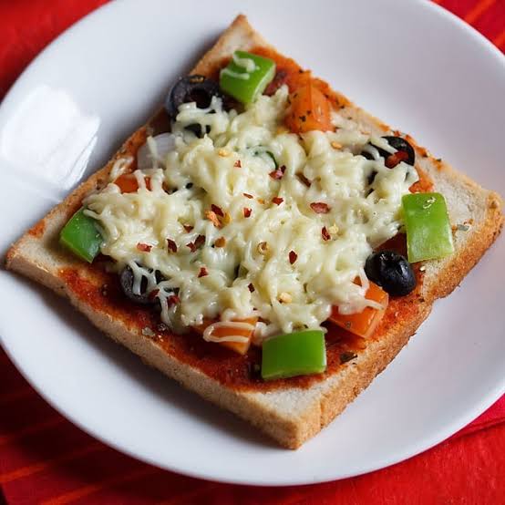 Our Special Bread Pizza Delicious Cafe & Restro Opposite Ganesh Mandir, Betab Gents Parlour, Freeganj, Mari Mata Square 452015