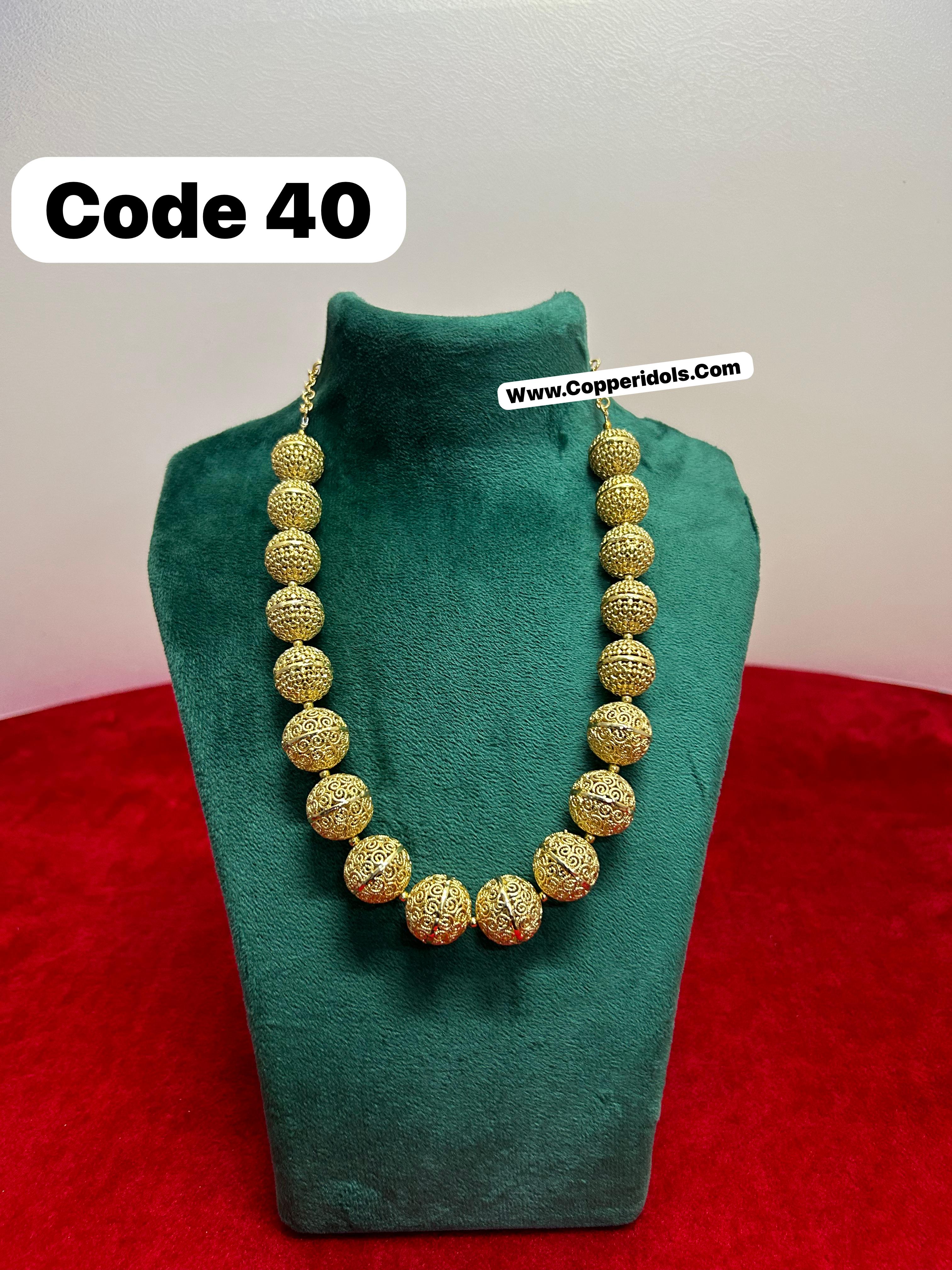 Panchaloha made gold polished necklace-https://i-media.vyaparify.com/vcards/products/69747/b43b776f-17fd-46dc-ae0a-04657e41fab3.jpg Image