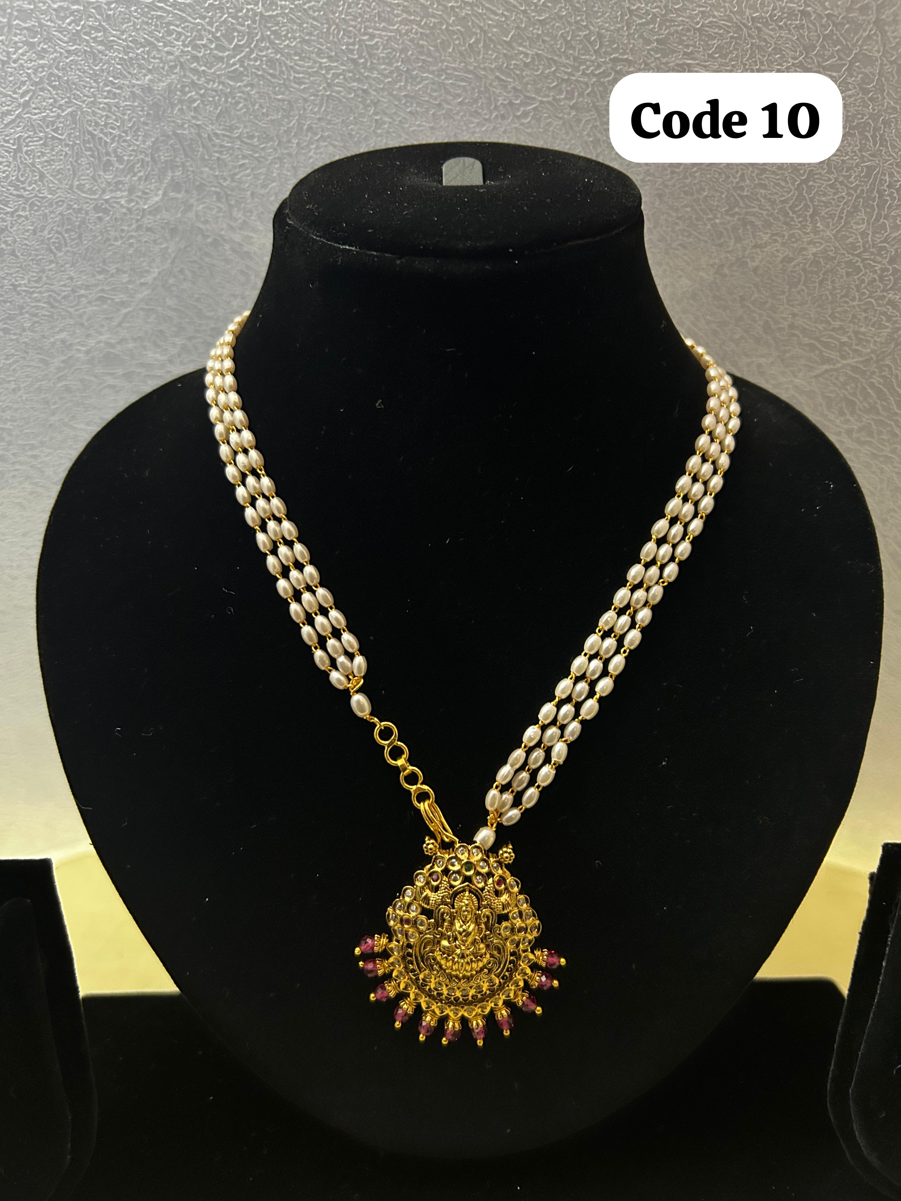 Panchaloha made gold polished Lakshmi pendant with pearl mala-https://i-media.vyaparify.com/vcards/products/70067/048F2ACB-3BB2-4E1A-B75A-7863B040B3A6-(1).JPG Image