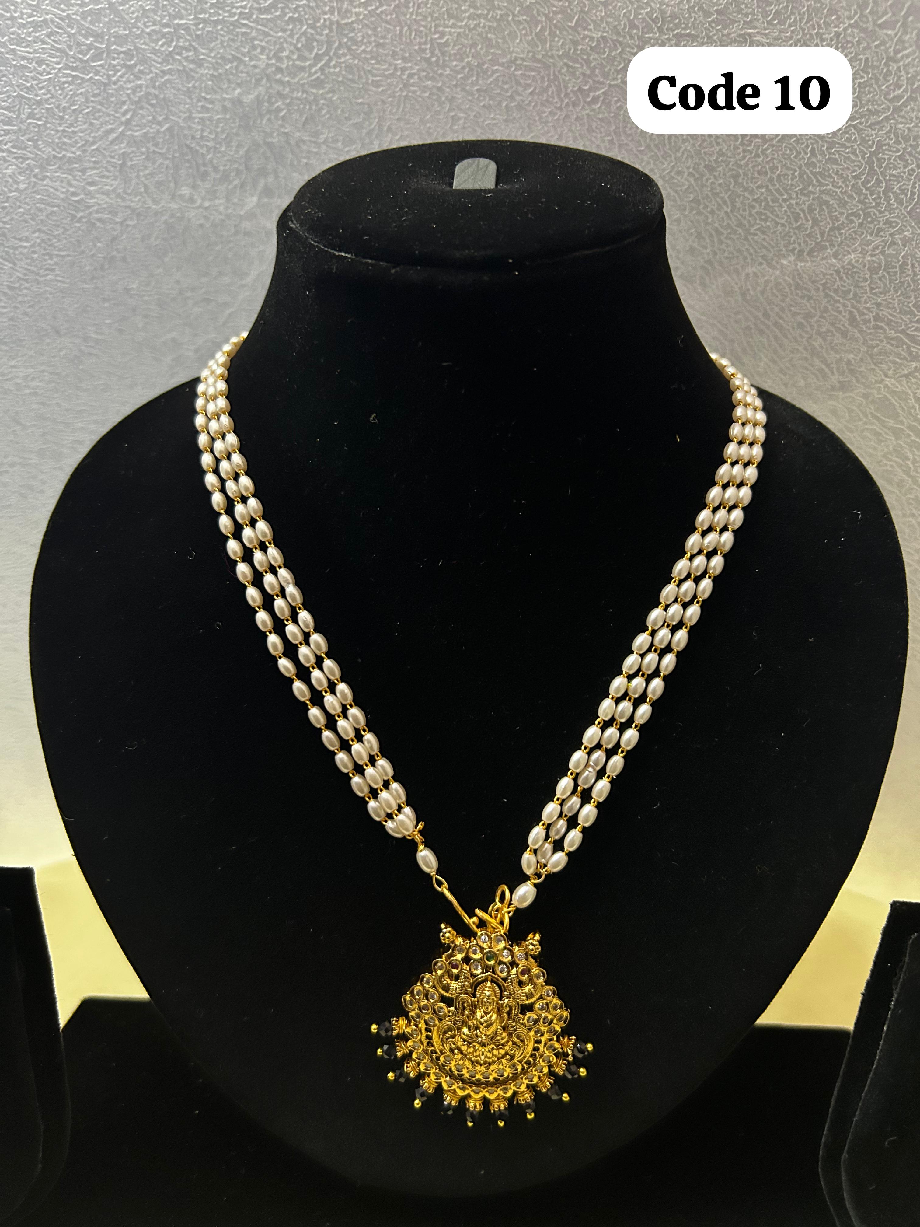 Panchaloha made lakshmi pendant with pearl mala-https://i-media.vyaparify.com/vcards/products/70068/E257BDF4-9526-4382-9802-F46F636CAB60.JPG Image