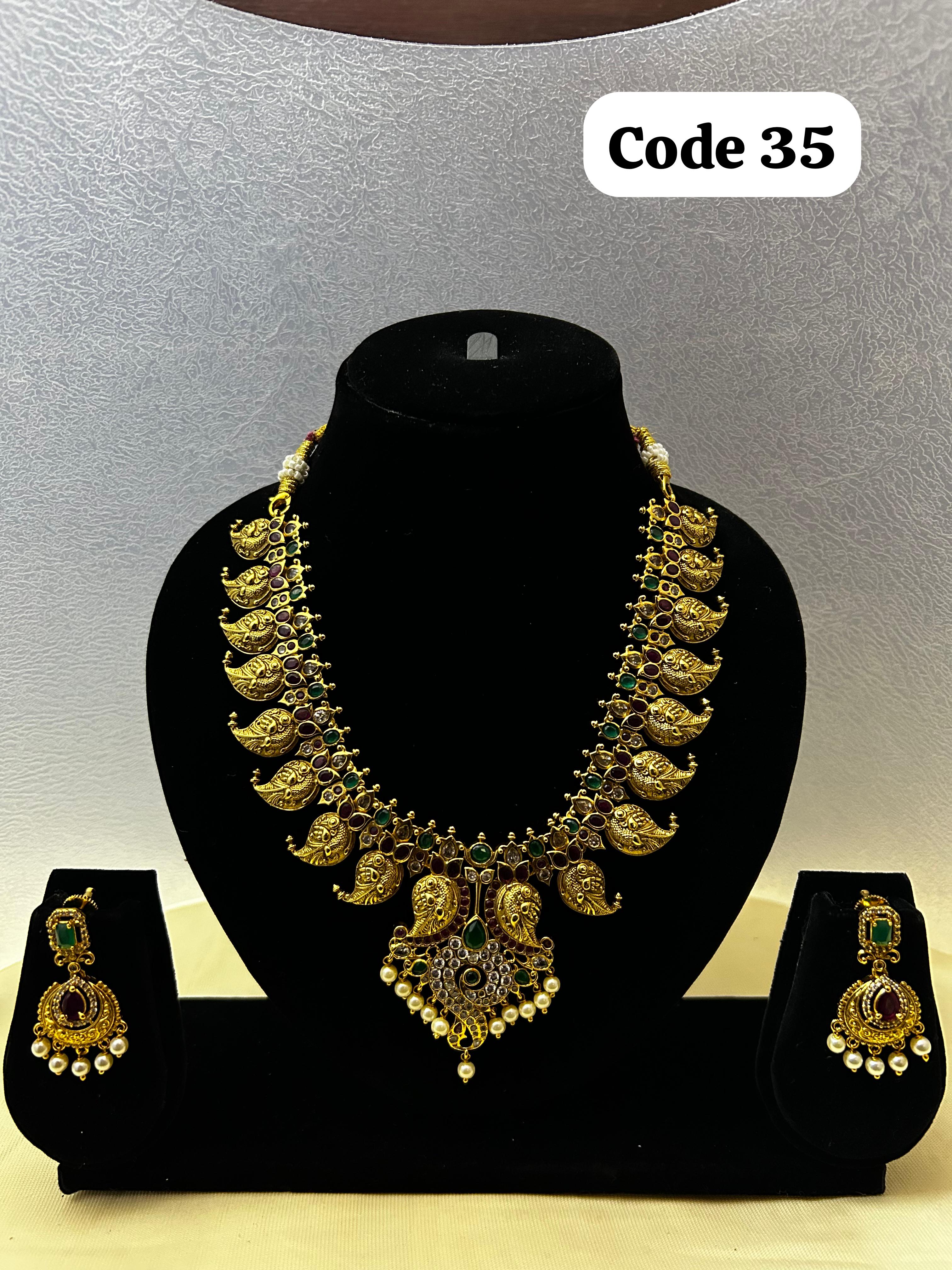 Panchaloha made gold polished semi precious stones embossed mango mala-https://i-media.vyaparify.com/vcards/products/70074/11790C1D-D954-4B38-BEF9-9005548F5669.JPG Image