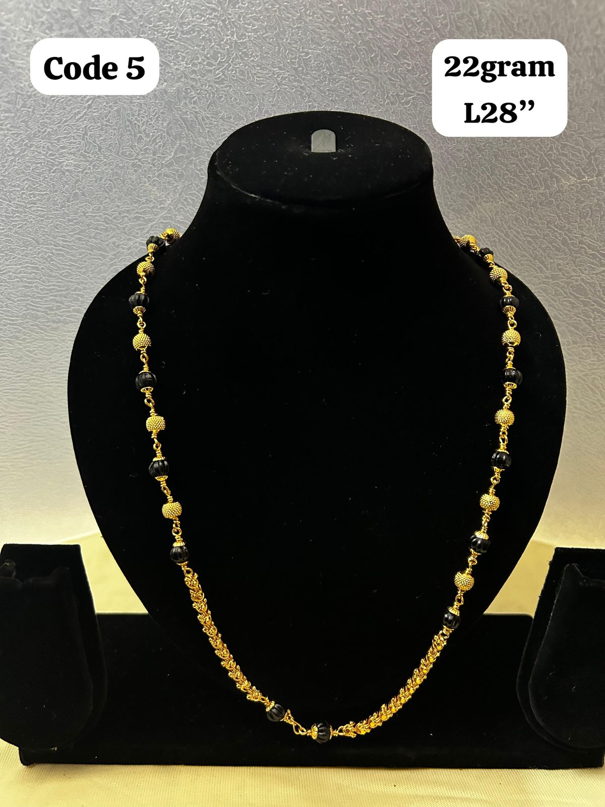 Panchaloha made gold polished gundu mala with black beads-https://i-media.vyaparify.com/vcards/products/70079/b76b7821-1d74-4ffd-84b7-033006530e1c.jpg Image