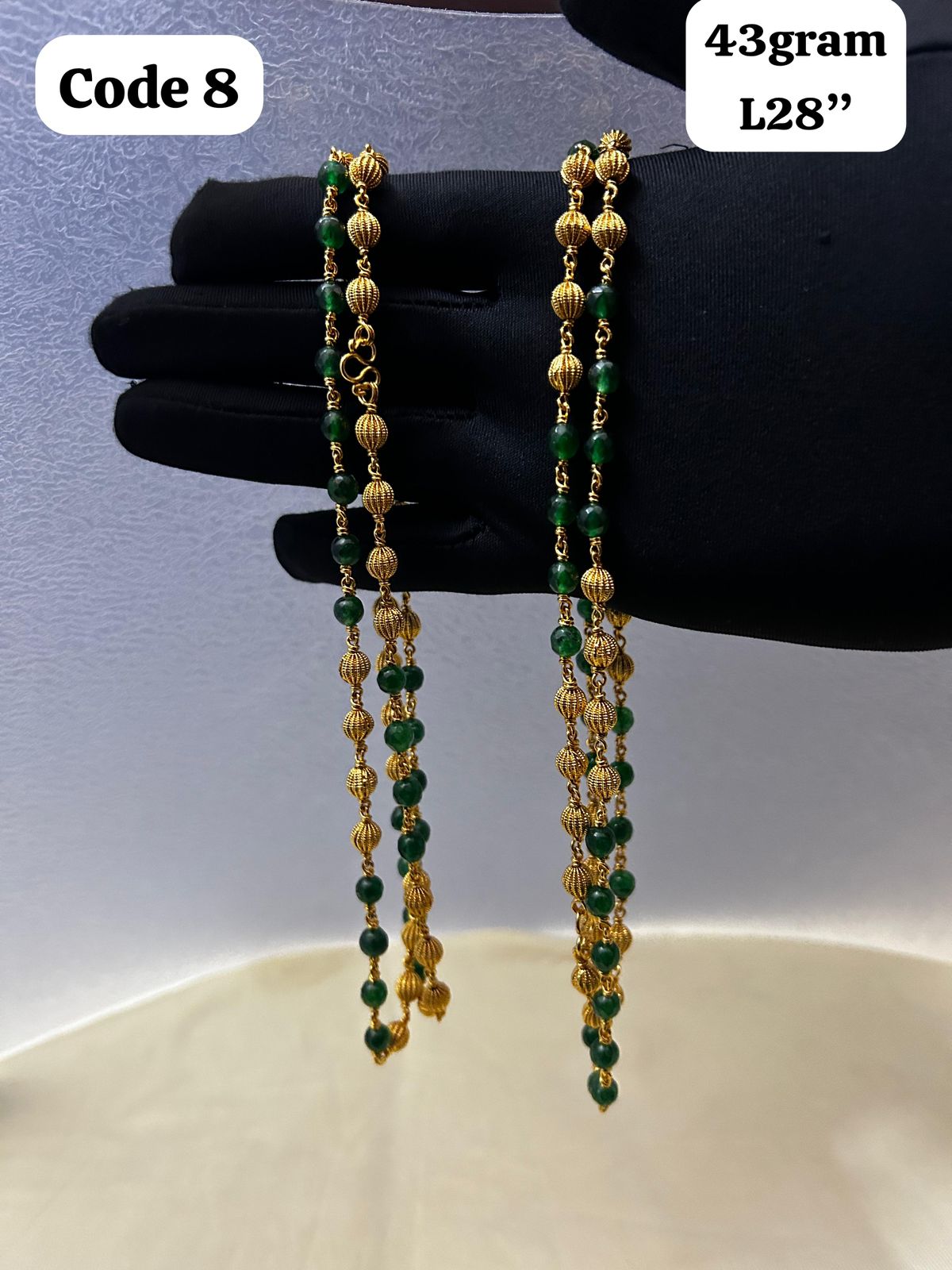 Panchaloha made gold polished gold mala with green beads-https://i-media.vyaparify.com/vcards/products/70092/0c01b872-69a1-4408-8d86-95d227a2f327.jpg Image