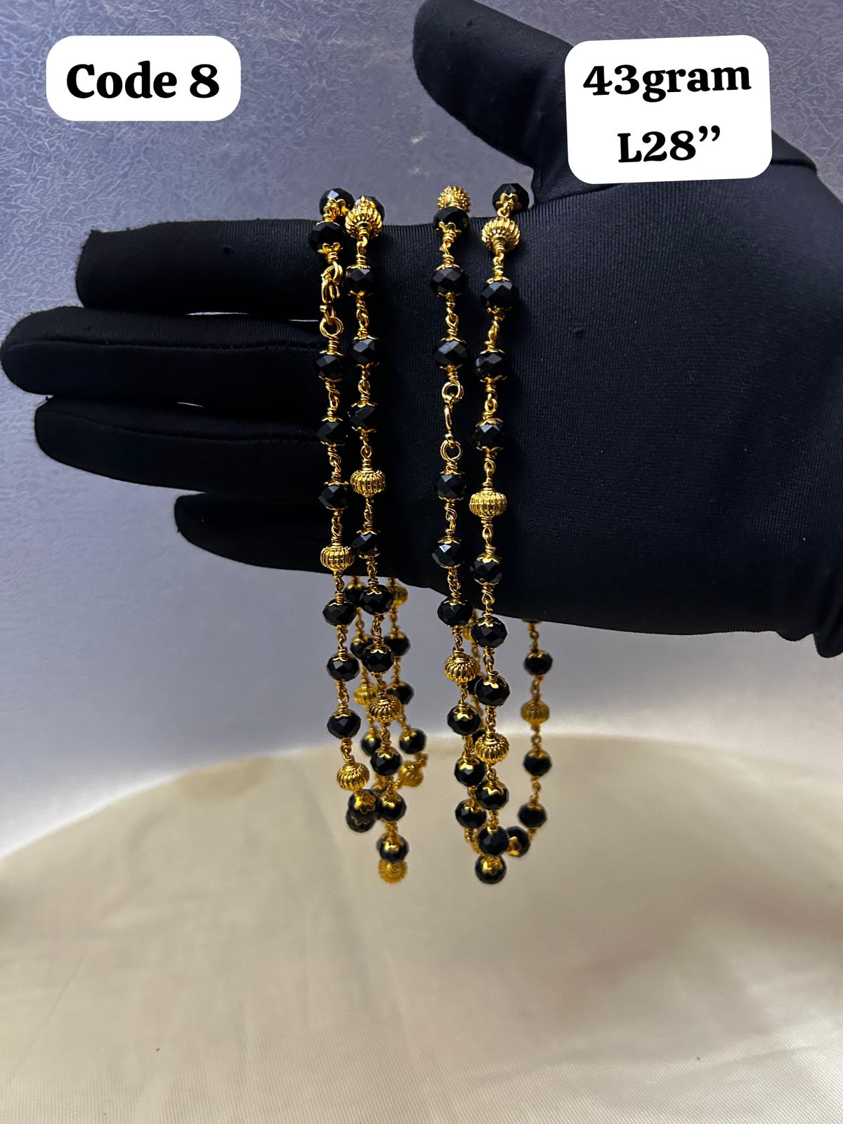Panchaloha made gold polished gold gundu mala with black beads-https://i-media.vyaparify.com/vcards/products/70097/9a0dea97-332e-4661-a0cd-8bd1defcd732-(2).jpg Image