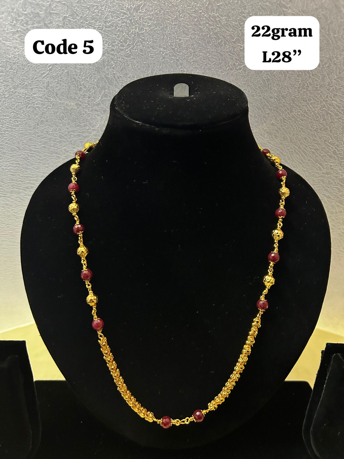 Panchaloha made gold polished mala with red beads-https://i-media.vyaparify.com/vcards/products/70098/d347f3d8-4e68-4962-b968-1afffce82ecc.jpg Image