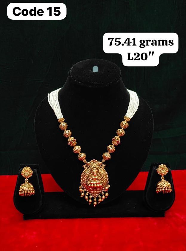 Panchaloha made gold polished lakshmi nakas gundu pendant with white bead chain along with earrings-https://i-media.vyaparify.com/vcards/products/73053/d2d86d99-dbea-47f9-8ab6-db26d9ca8001.jpg Image